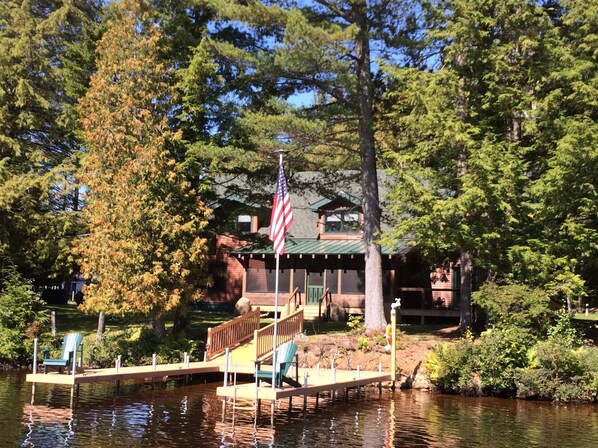 Spacious screened in porch provides an excellent view of lake.