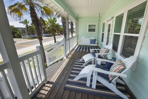 Relaxing Front Porch Retreat Ready For Your Morning Coffee