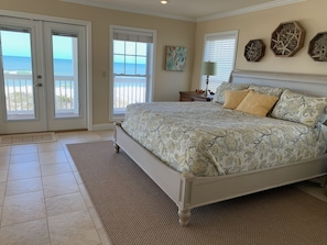2nd floor Master bedroom. King sized bed, with private bathroom and deck.
