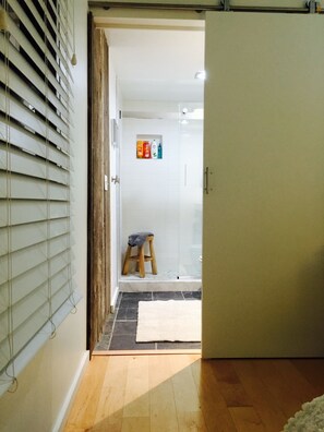 Sliding door entrance in Master to attached bath. 