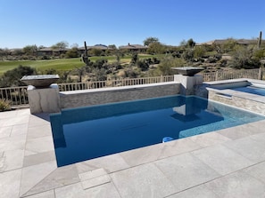 Pool with marble & quartzite trims, easy cell phone app operation, fire pots