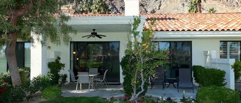 Private, shaded back patio. Photo taken from the 11th fairway.