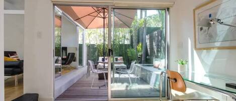 Bedroom with view of the private patio