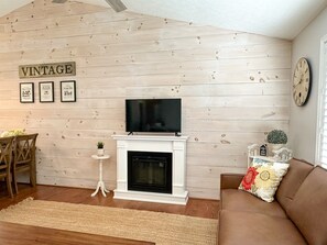 Upstairs living room with fireplace & 40" flat screen HDTV & DVD player