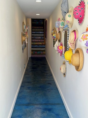 Painted floor at private entrance. Unit can also be entered via elevator access.
