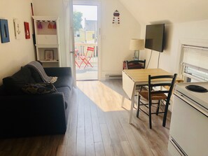 Living room with dinner table.