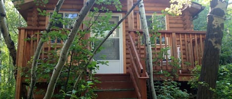 Enjoy a peaceful, cool stay in the Montana cabin's shady Aspen grove