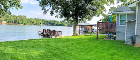 The perfect spot for you to enjoy lawn games and a picnic by the lake!