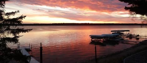 Beautiful Sunset overlooking the beach and dock on Crosslake