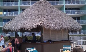 Tiki bar for food and drinks at the pool.