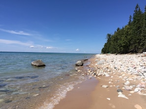 Our beach is a mix of rock and sand.