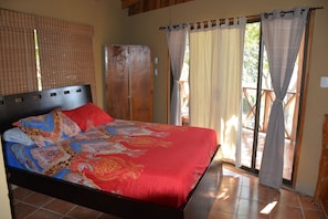 Villa Cocobolo loft bedroom with view of private balcony