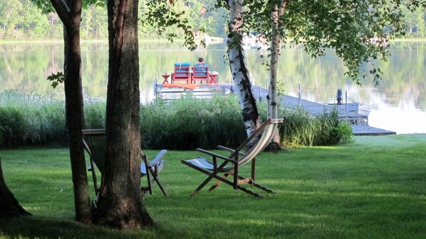 The level lake frontage is private and serene.