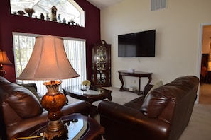 Family Room with 65'' Sony Led Cable TV and Water View