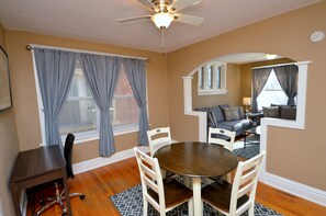 Bonus Room With Dining Table, Desk And Office Chair