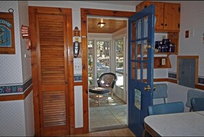 enclosed sun porch with washer and dryer