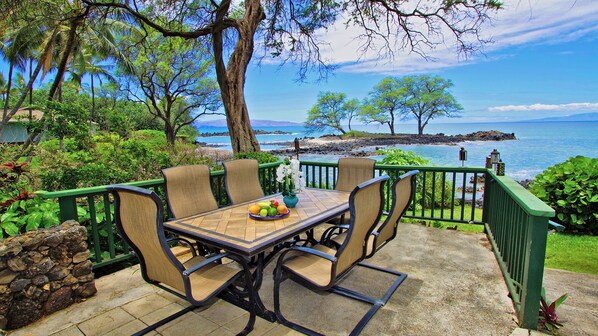 Oceanfront Dining Area With Nearby Gas Grill
