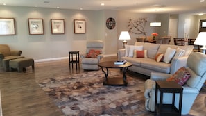 View of the Family Room/Great Room with 2 recliners and sofa
