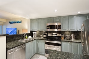 Beautifully renovated kitchen with new stainless GE Profile appliances