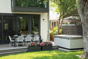 Outdoor dining and hot tub (with regular service included).