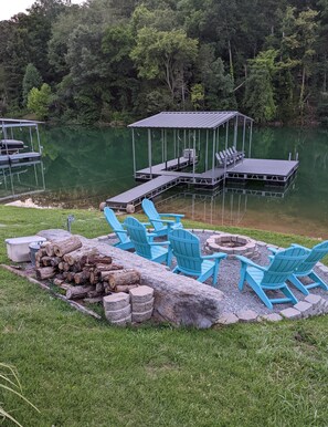 Lakefront fire pit with firewood provided. New boat dock in 2022.