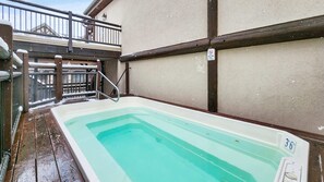 Guests can enjoy shared amenities such as an outdoor pool, hot tub and a fitness room.