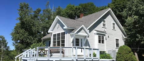 Entrance and south side of house