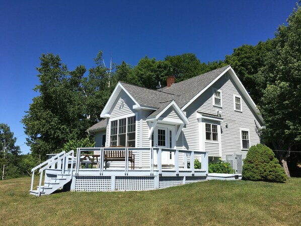 Entrance and south side of house