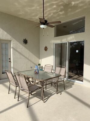 Lanai area with ceiling fan to keep you cool on those hot days