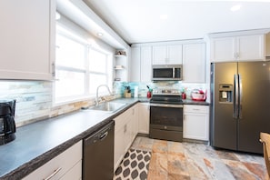 Fully remodeled and well appointed kitchen.