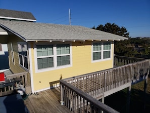 A connecting deck attaches the Studio to the Main House, with grill and hot tub.