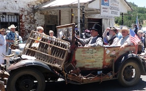 John Muir's Grandson (back right) riding in local Coulterville limousine.