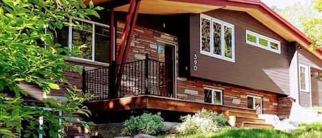 Modern home with natural prairie grass  landscape.  Premier Boulder location.