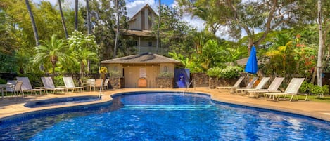 Sparkling blue pool with change rooms. (no hot tub)