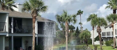 View of our unit from beach boardwalk 
(Our unit- L bldg top R side) L of water 