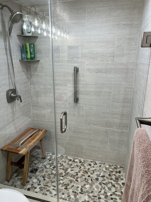 Walk In Shower. Detachable Shower Wand With Message. Teak Chair. 