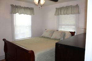 Bedroom with Queen Size Bed and Large Dresser