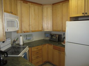 Newly Remodeled Kitchen w/Granite.  Yes, Dishwasher and Blender Included