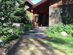 4 cascading granite slabs and a step up to the porch make it an easy entry.