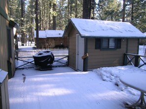 Back deck winter with Casita and BBQ area