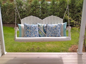 Porch swing made for two! Great for afternoon naps in the sun!