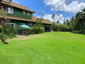 Sit on the patio and enjoy large landscaped yard