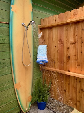 Outdoor shower with herb garden. Smell Rosemary while you shower