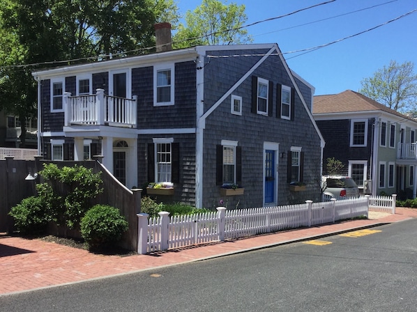 Commercial street view with new picket fence
