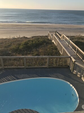Walkway to Beach. Also shows gate and how pool is exclusive to the East side.