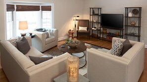 Living Room w/ HD TV + Sound Bar for Your Personal Play List 