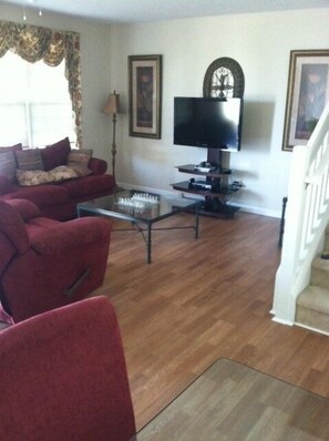 Living room 42'HDTV, Unit 2, Loveseat, chair, Playstation
