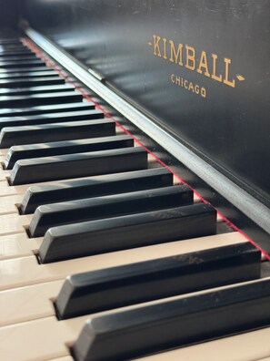Feel free to play on this beautiful vintage Kimball baby grand from the 1930's.