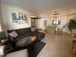 Relax in our spacious living room with a flat screen TV and comfy couch!