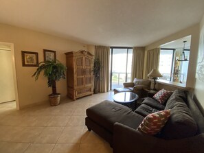 Relax in our spacious living room with a flat screen TV and comfy couch!